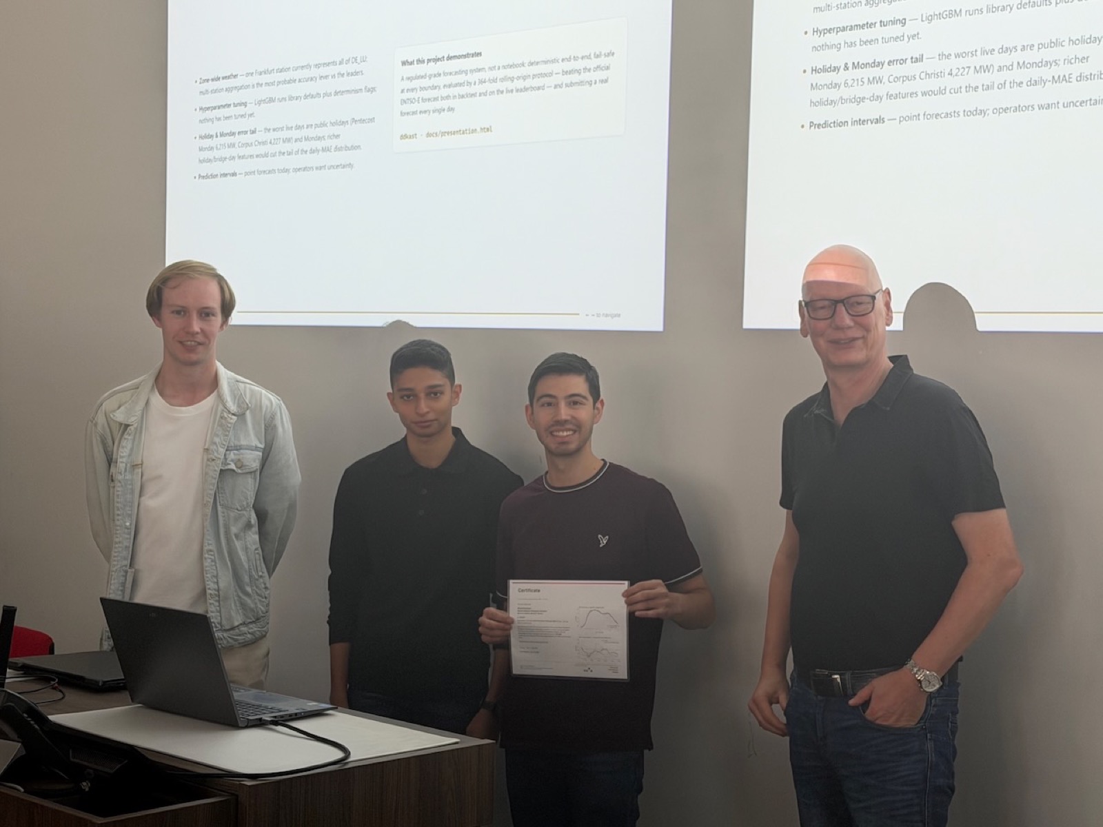 Prof. Bartz-Beielstein hands a certificate to one of the teams